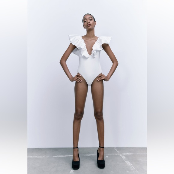 RUFFLED BODYSUIT - Picture 1 of 9